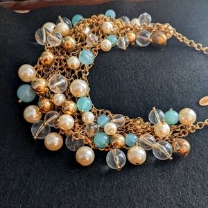 Gold, blue and white necklace